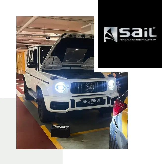 Sail car battery beside a Mercedes SUV in a carpark