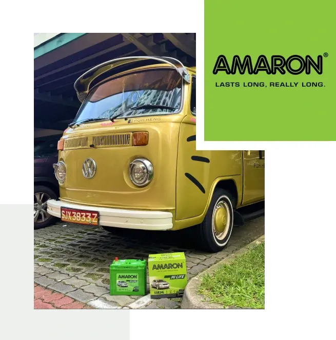 Amaron car battery beside a vintage Volkswagen van